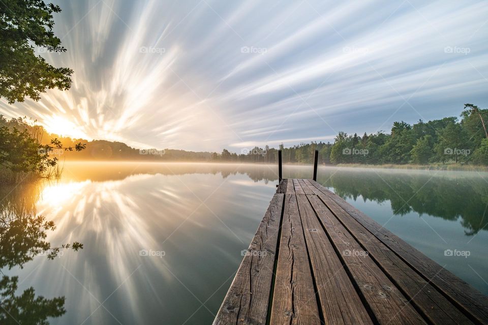 Sunrise over a river in switzerland