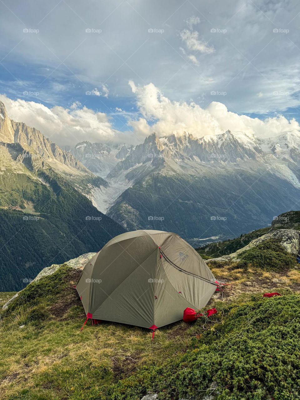 Camping in the mountains, with a view towards les Aiguilles des Chamonix, French Alps.