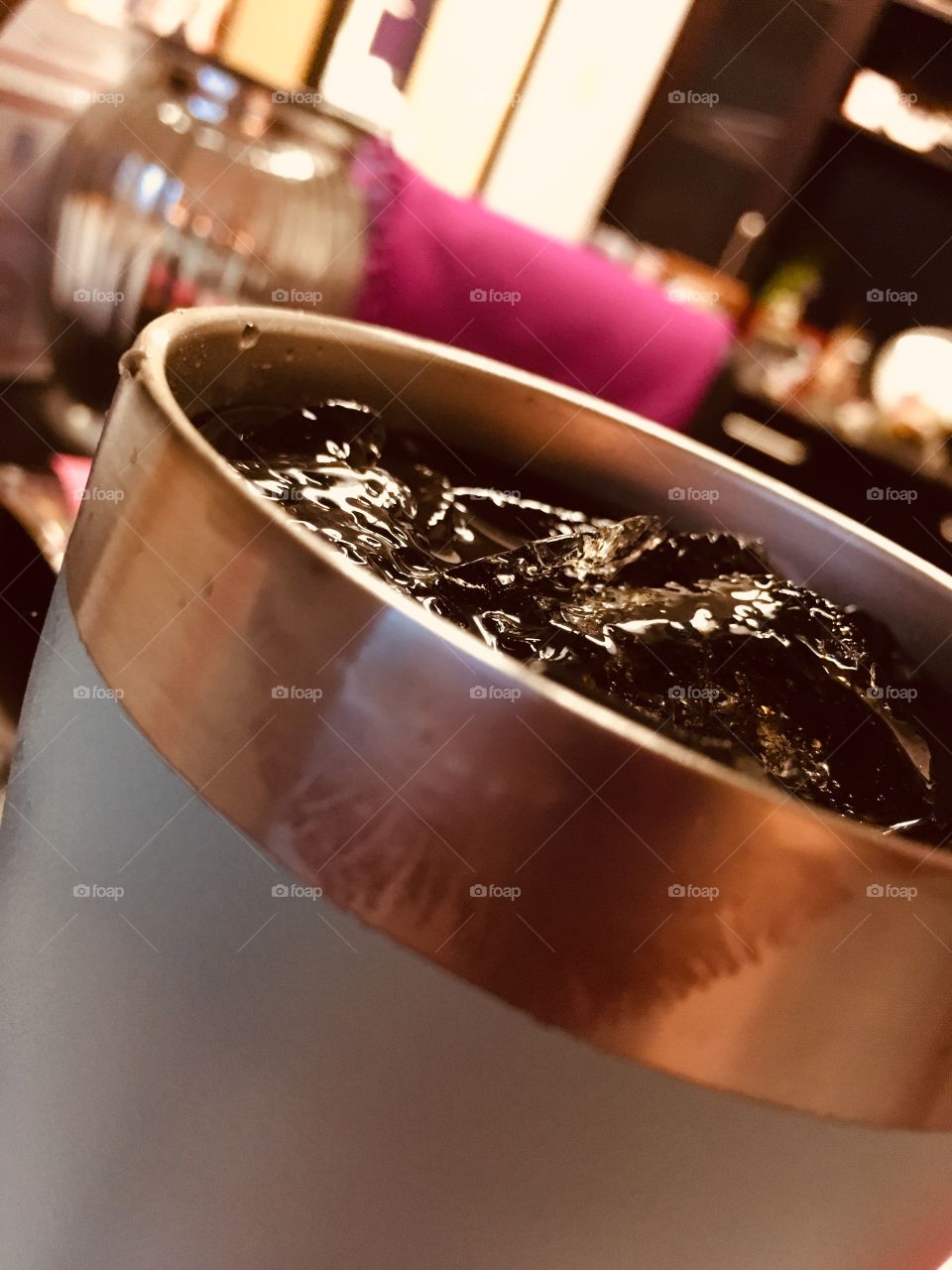 Cup with Coke and ice with lipstick marks
