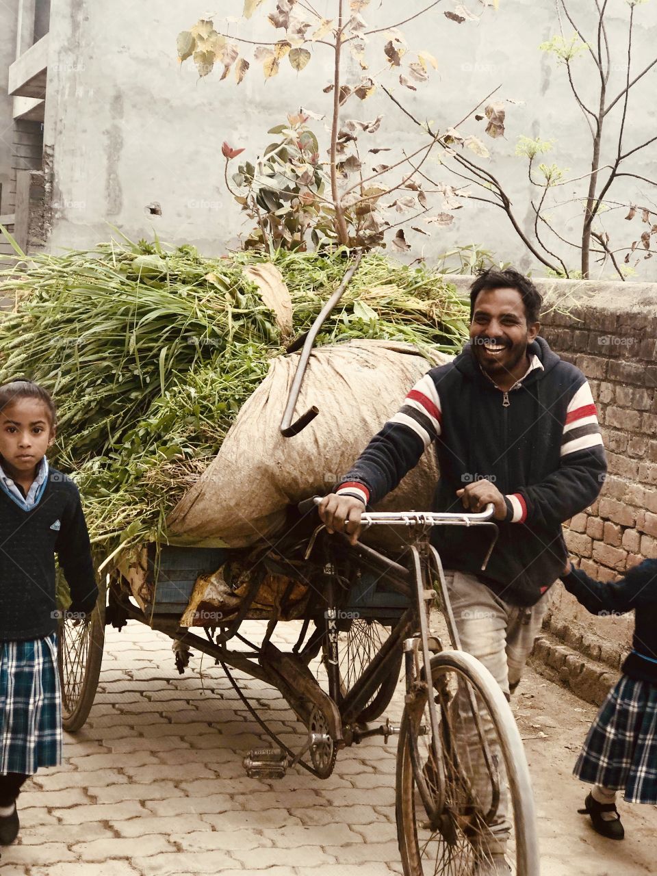 Hard working man with his Daughters 