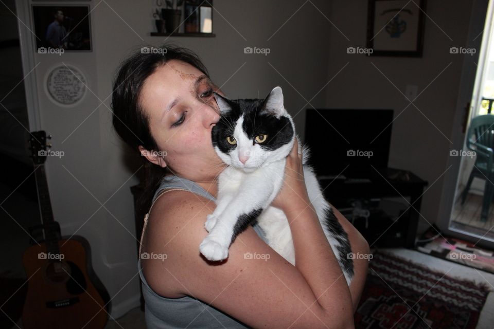 Kissing the Kitty Cat