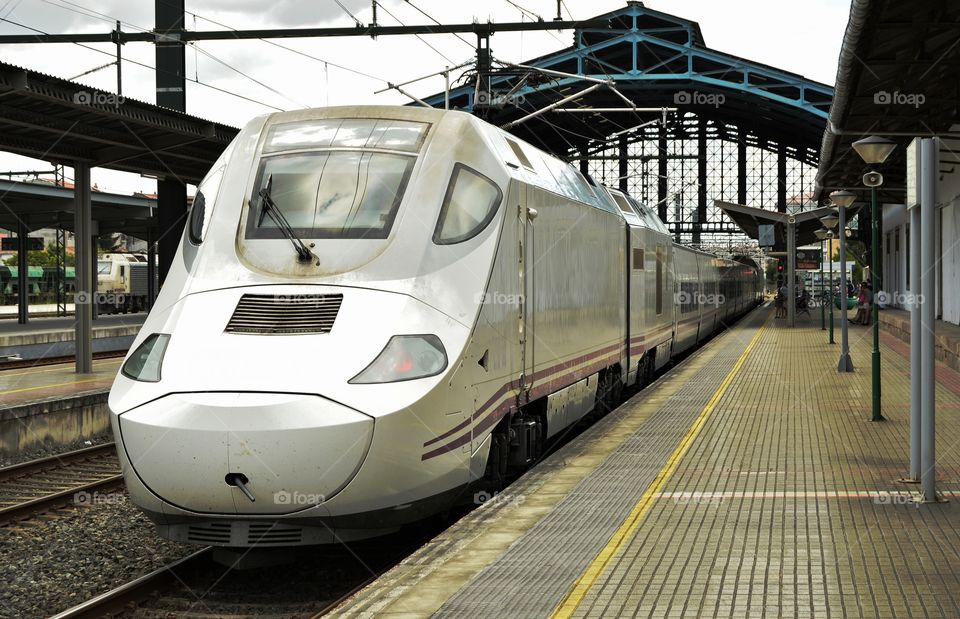 Waiting for the train at Santiago de Compostela railway station.