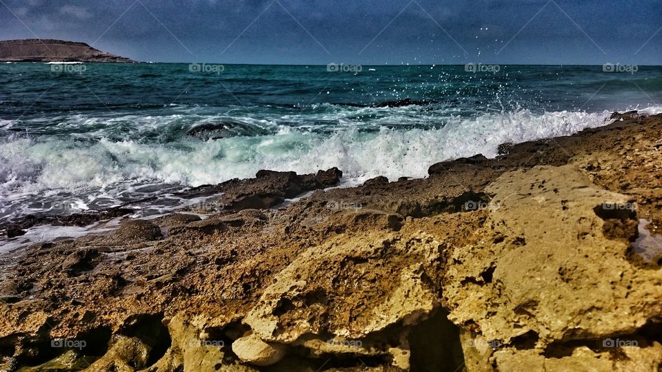 Wave splashing on rock