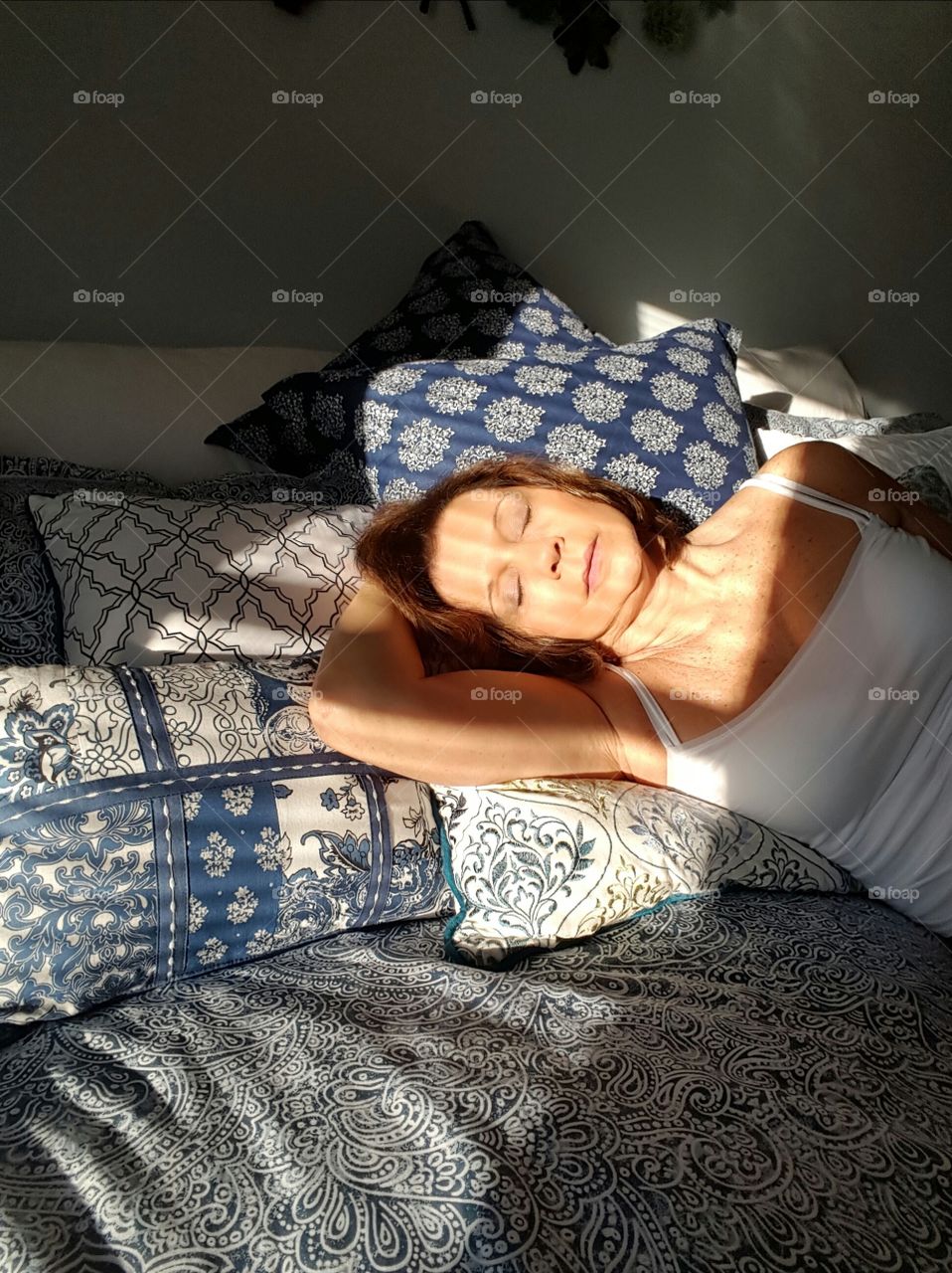 Beautiful woman sleeping on bed