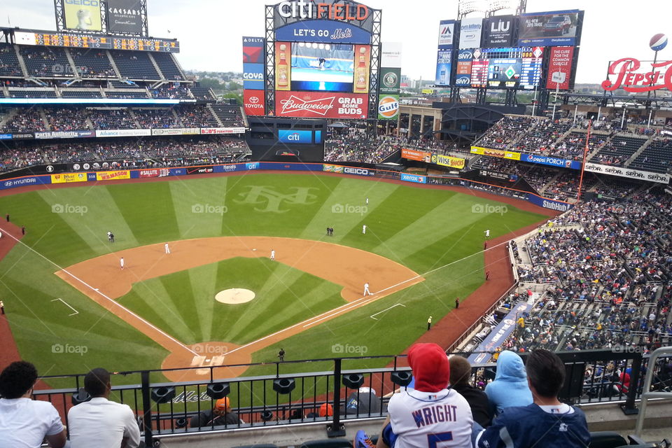 watching the game. citifield