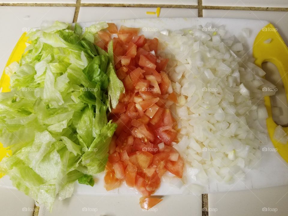 Salad and cutting board