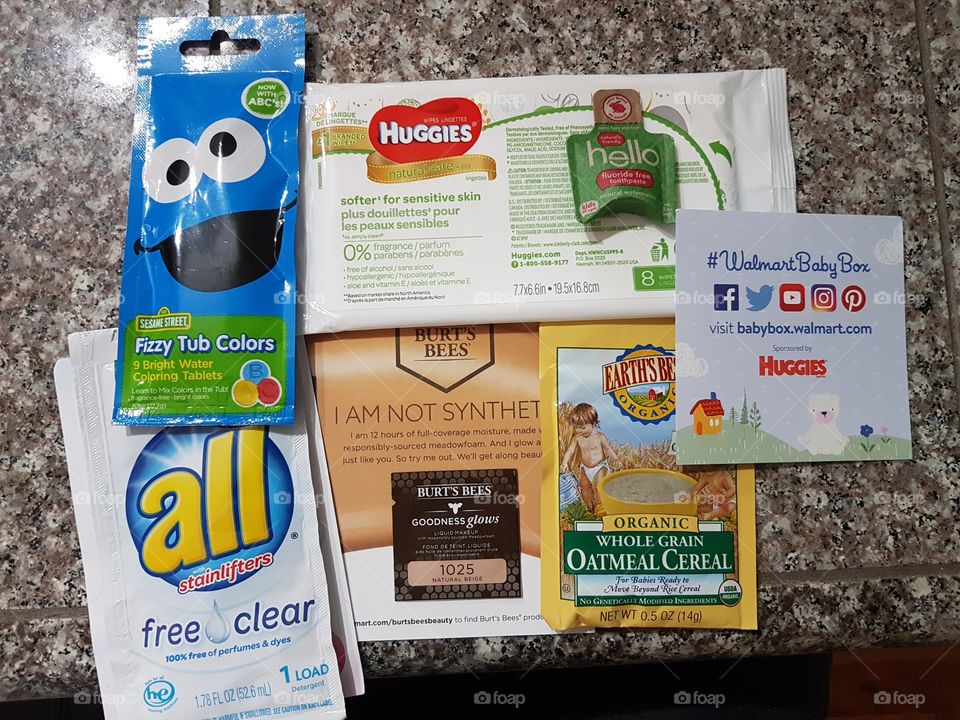 Samples from Wal-Mart Baby Box: all free & clear detergent, Buggies wipes, Earths Best Oatmeal, Burts Bees Make-up, Sesame Street fizzy tub colors, hello strawberry flavored toothpaste.