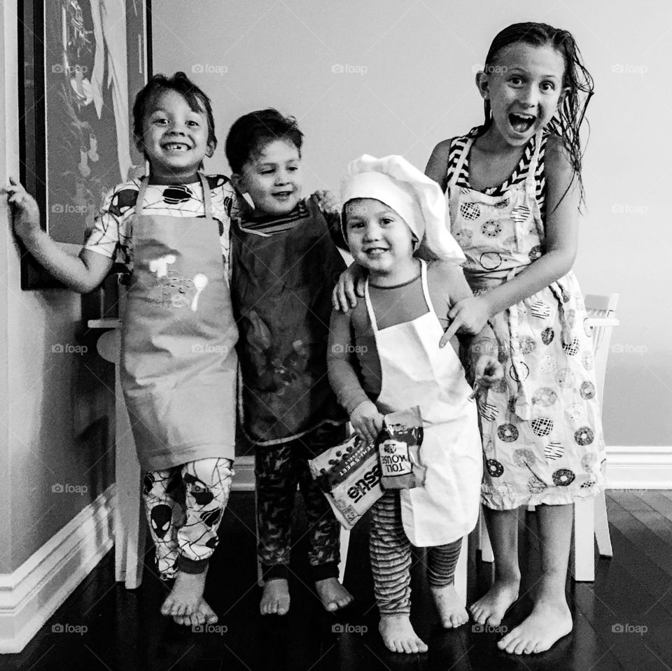 Happy children in apron
