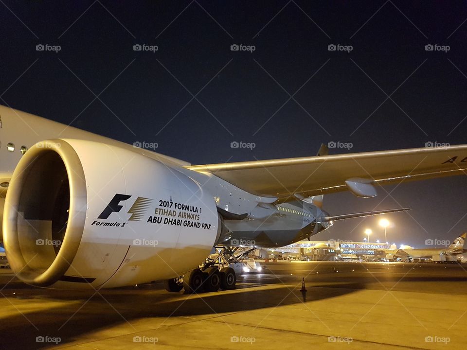 new Airbus A380 Etihad airways at Abu Dhabi airport waiting for boarding night flight
