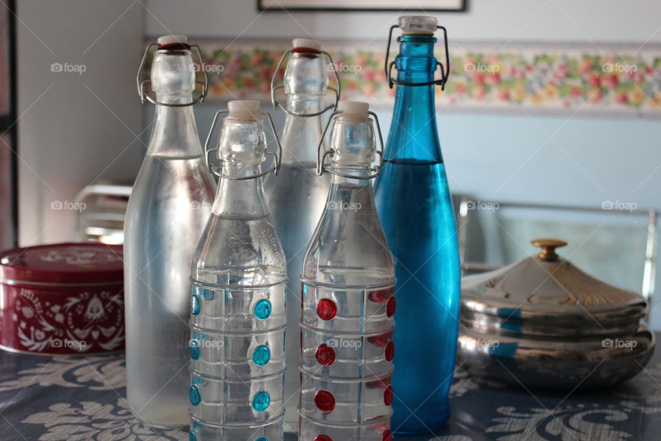 glass bottles and metal sheet containers