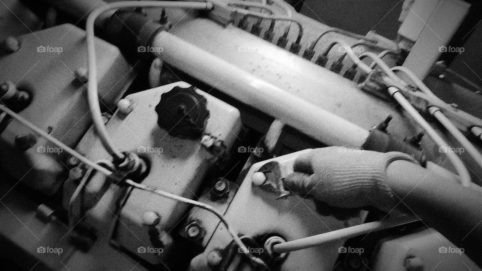 Adjusting the engine.