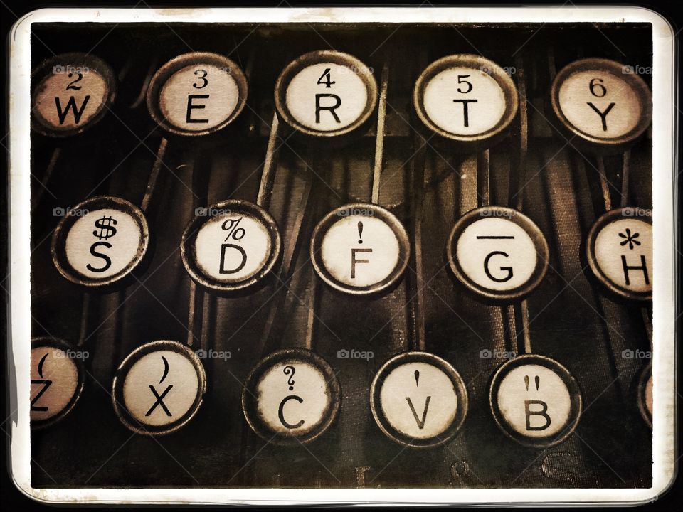 Antique  typewriter with round keys- Sepia tone
