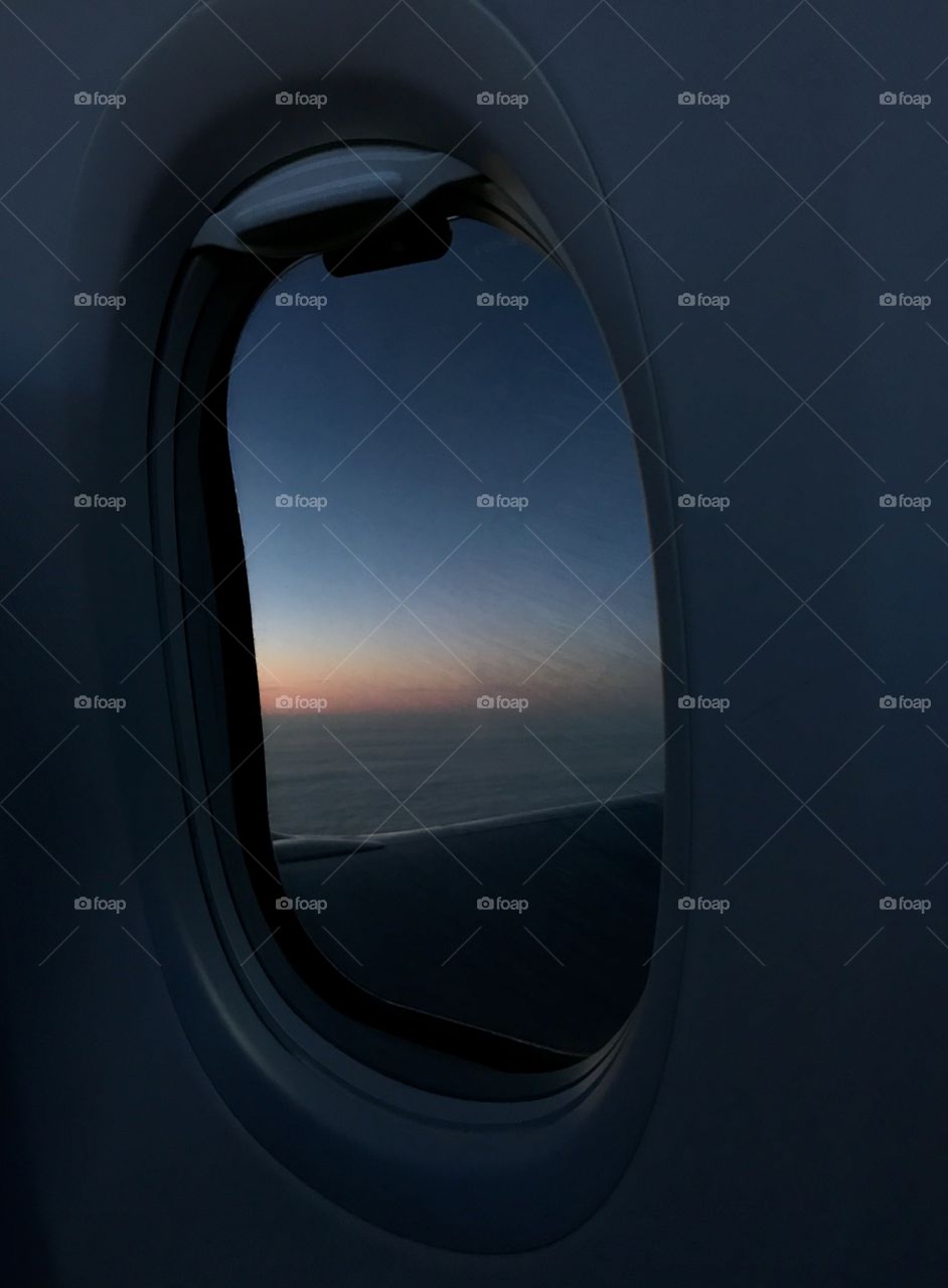 Clouds seen through airplane window