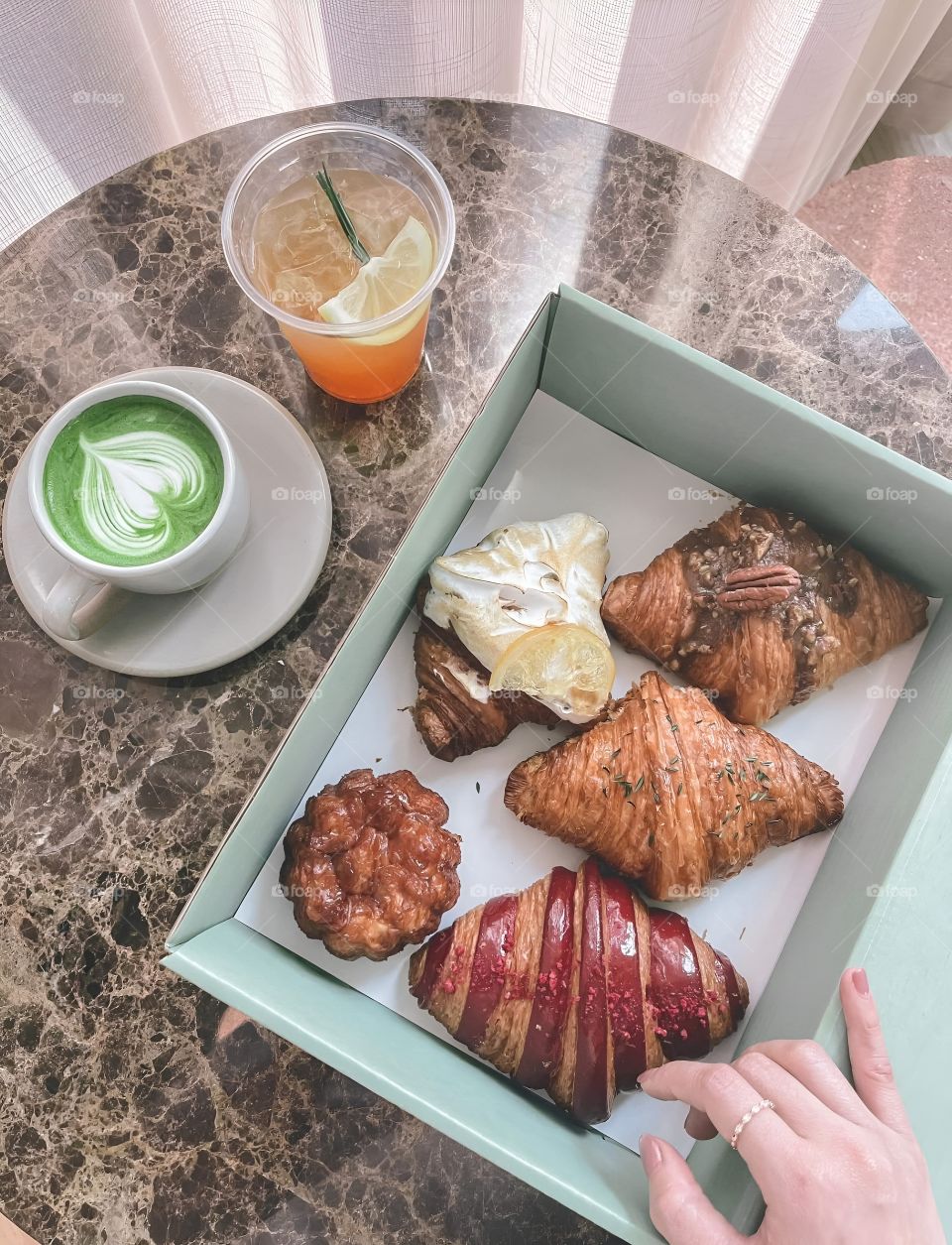 Multi-flavored croissants and green tea