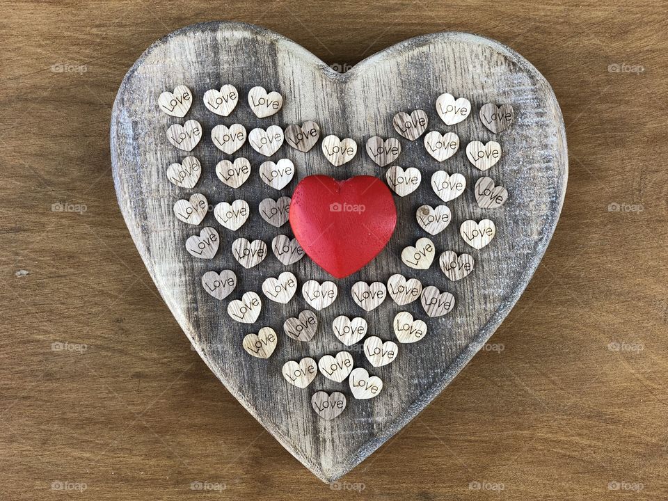 Love concept with wooden hearts