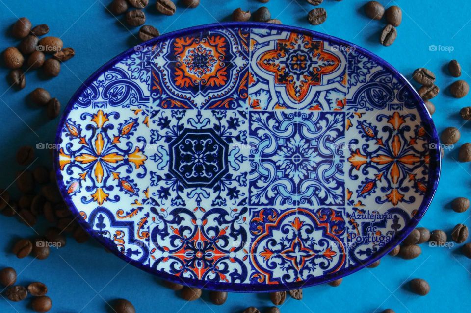 Colorful plate on blue a background