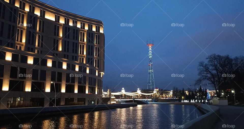 beautiful night light street view, windows magic light, cityscape and reflection in water