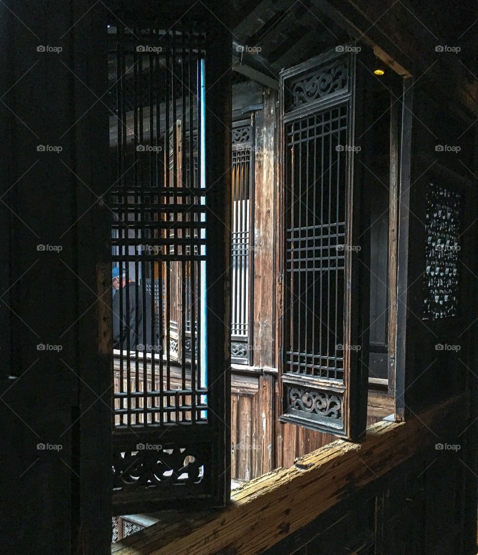 The art of composition - geometric shapes and patterns. This intricate wood carved structure, with natural light seeping in, is so beautiful