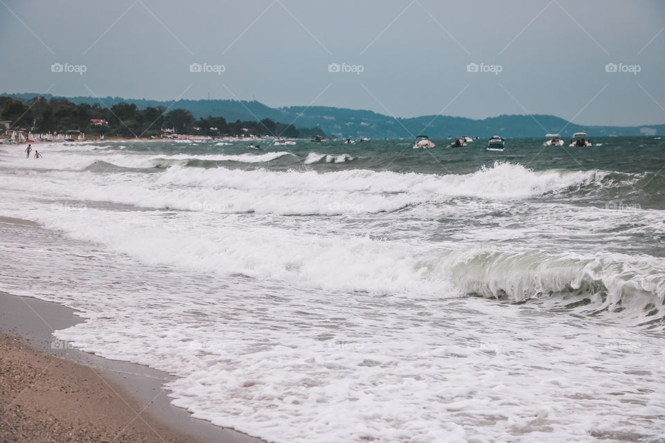 Horizontal seascape view to the storm with huge waves near the coast.