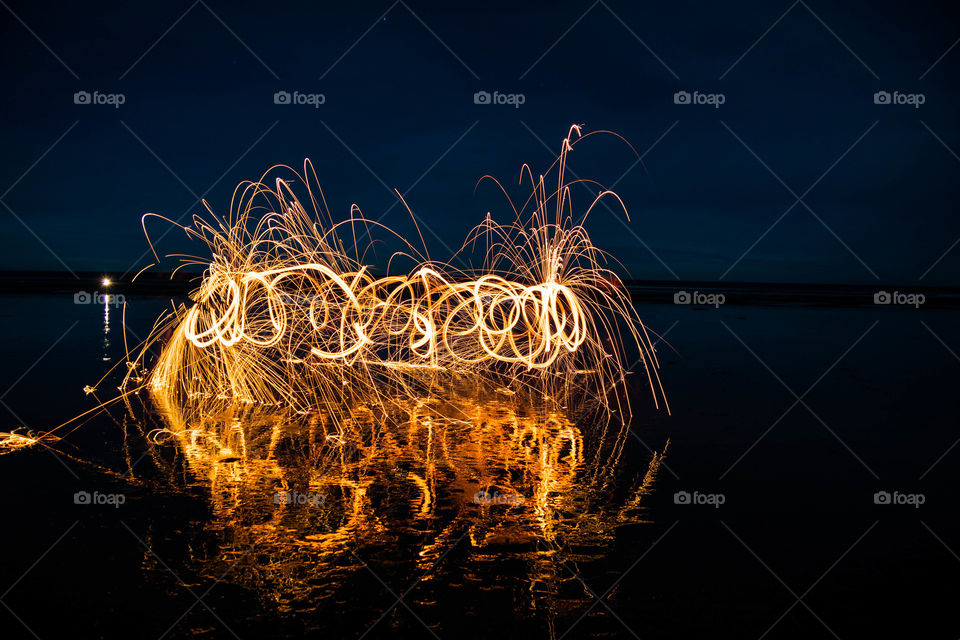 In the middle of this my neck caught fire and it made the sparks fly even more, so the photo turned out really cool but my neck got really burnt.