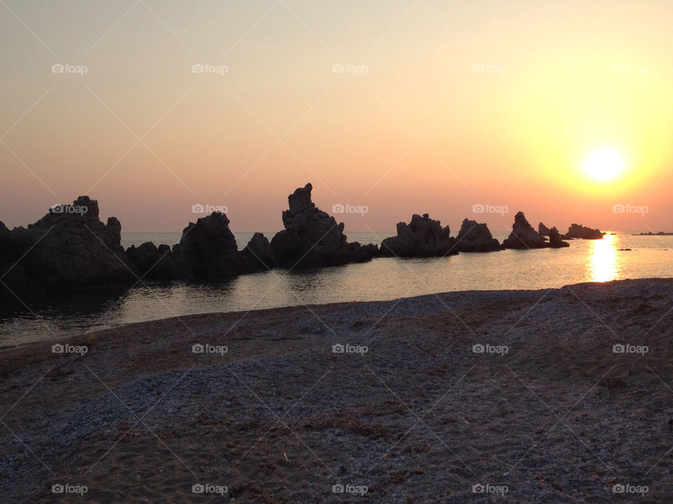 beach sunset sea rocks by zacharis81
