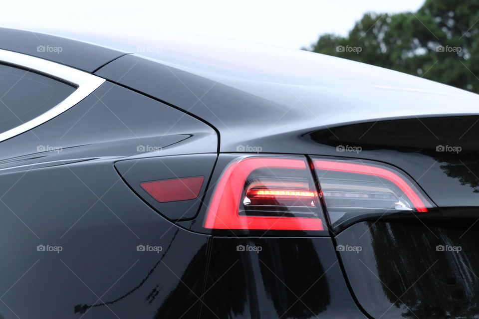 Black automobile taillight and back details
