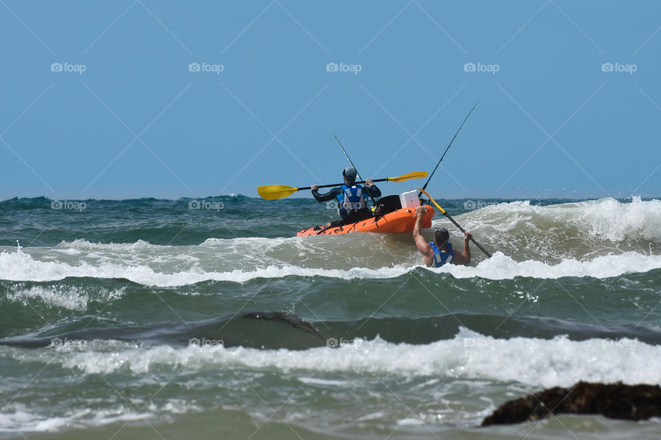 Fishermen With Ocean Kayak In The Waves, Mossel Bay, South Africa