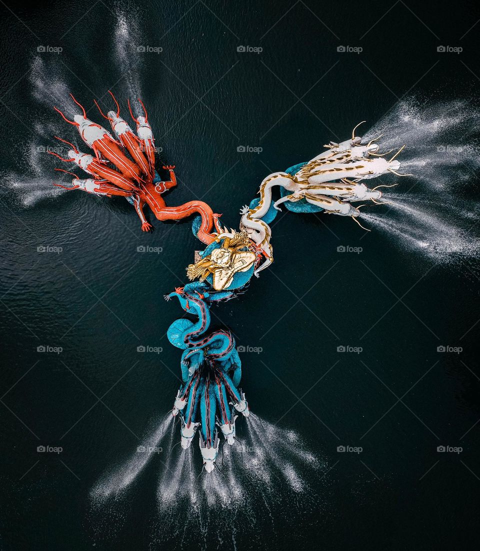 Dragon Shaped Fountain Sits In The Water