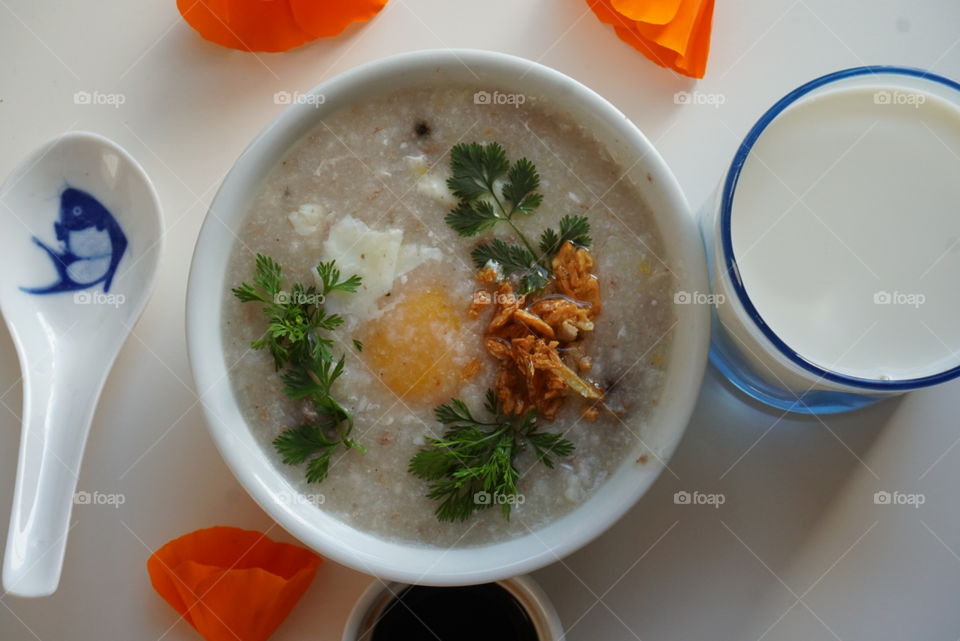 Fun breakfast rice soup sunny side up