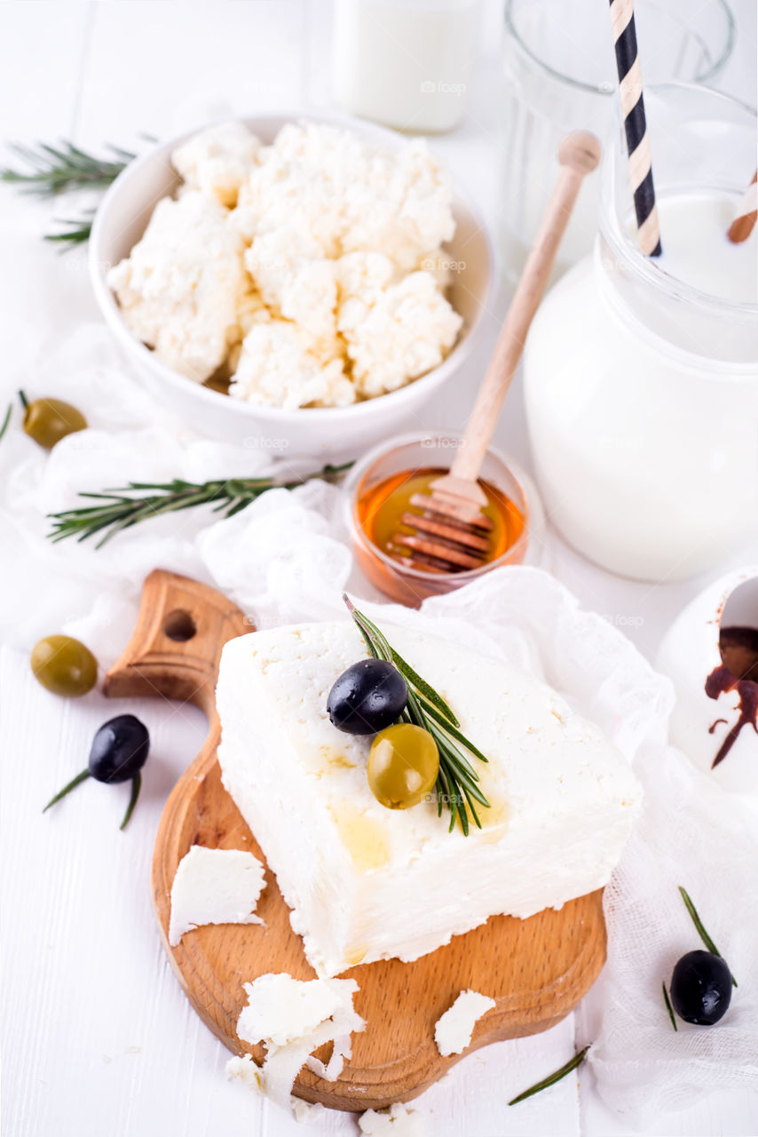 Cheese with olive and honey