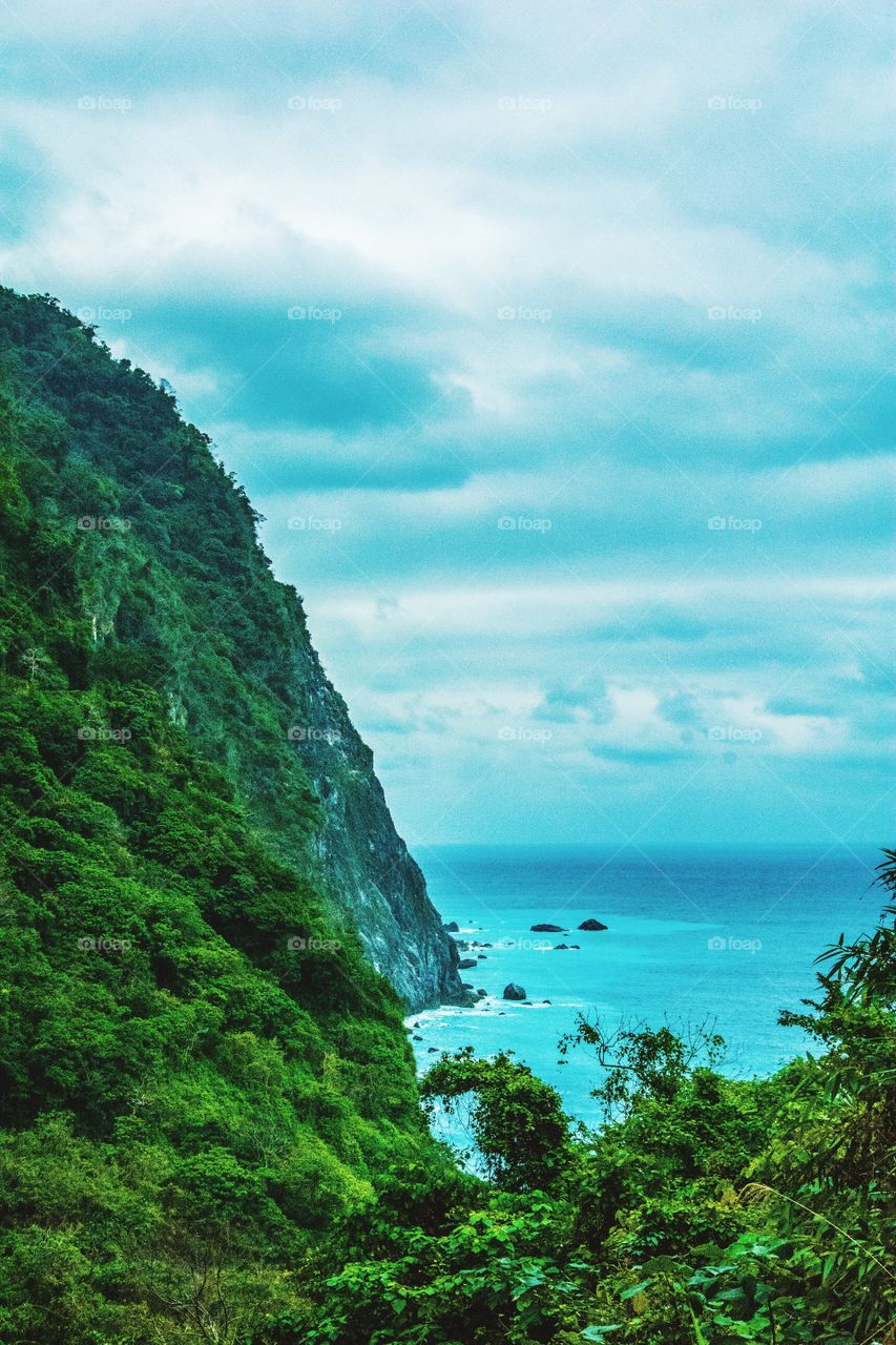 Beautiful the view of the rock by the beach