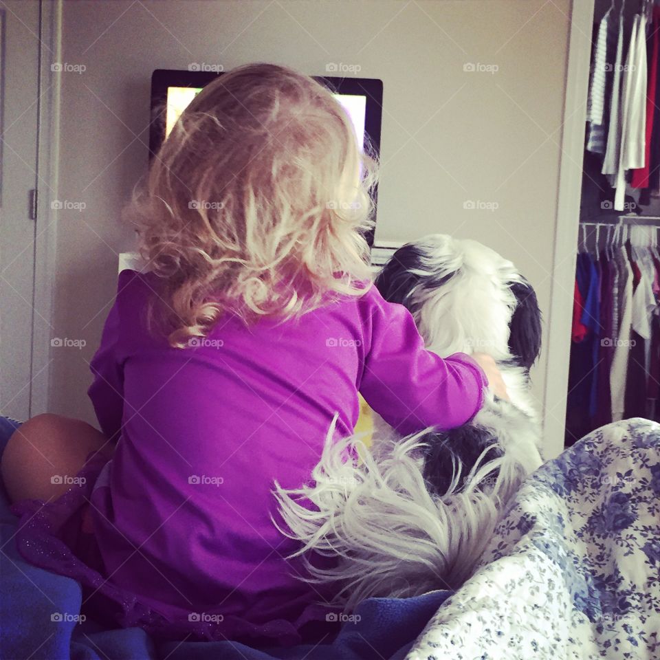Saturday Morning Cartoons . A girl and her dog 