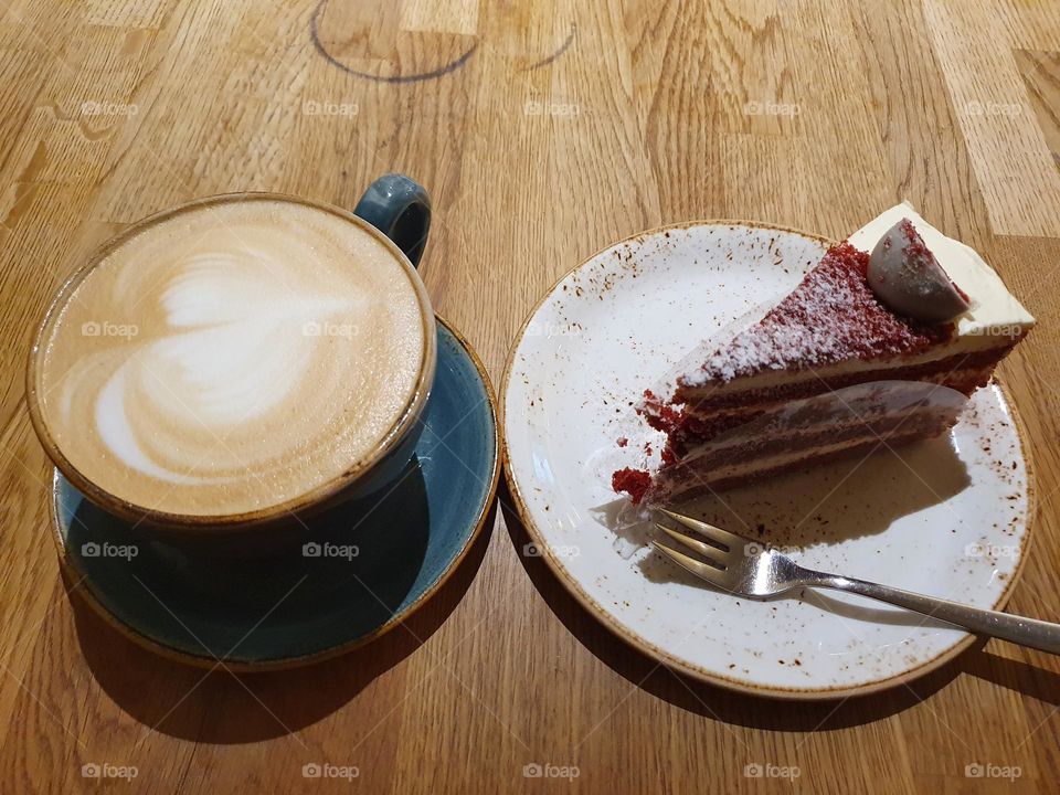 Evening coffee with a red velvet for dessert.