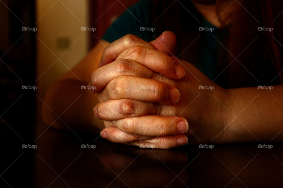 hands in praying position