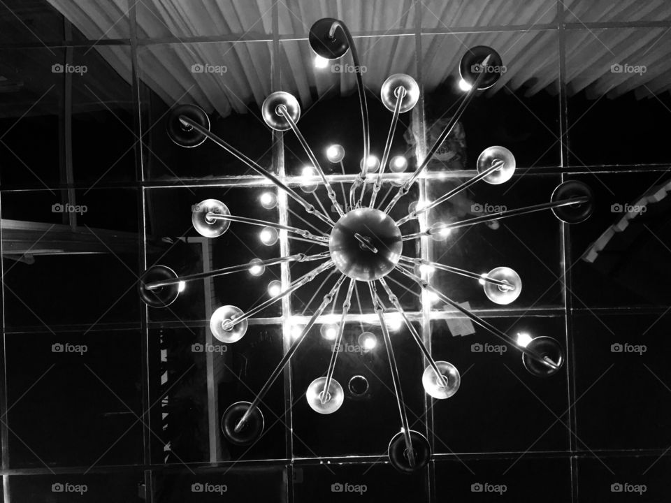 Black and white chandelier from below.