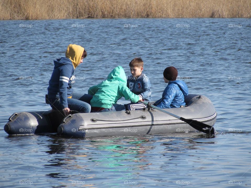 Children on a rubber boat