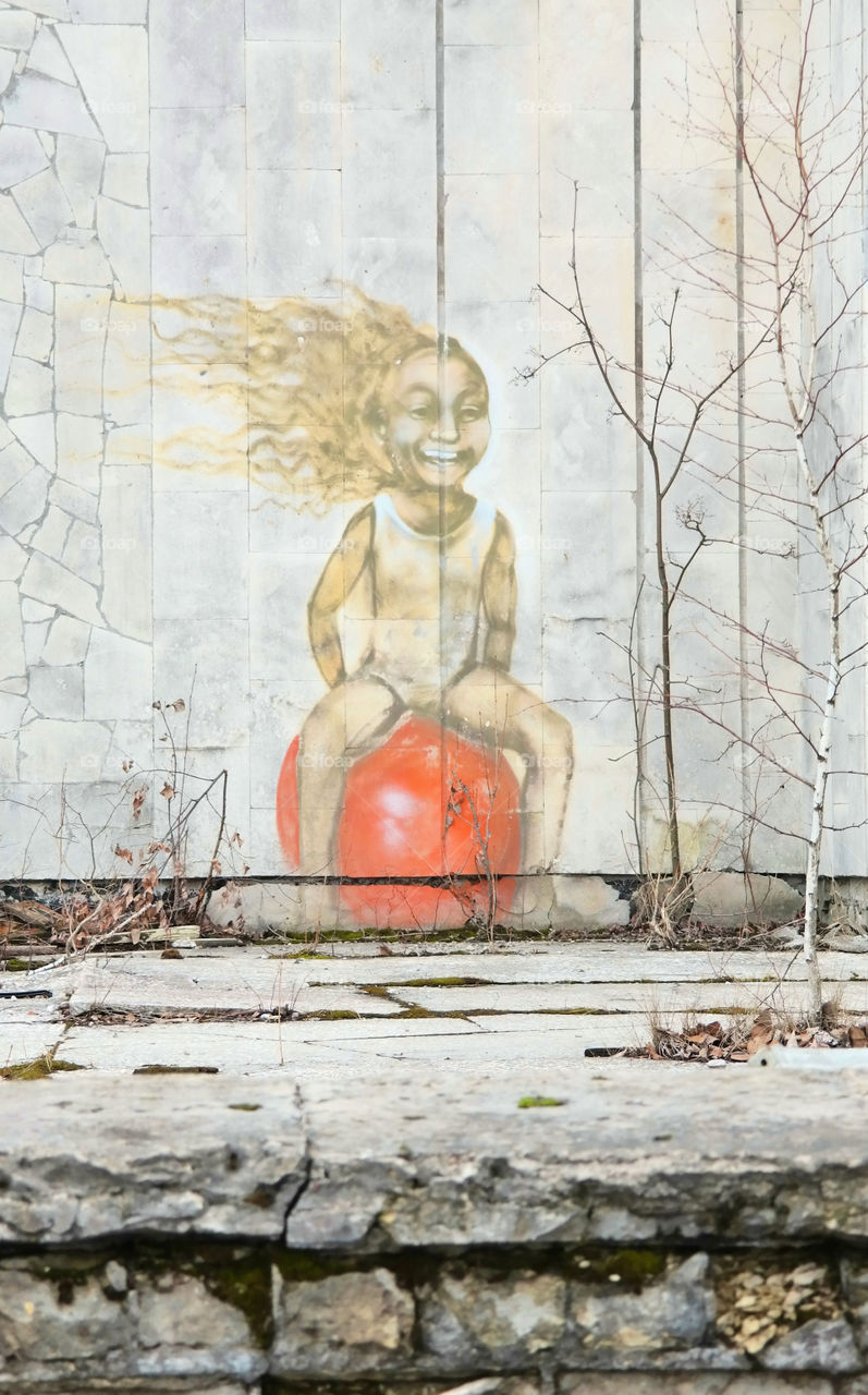 Girl playing with ball