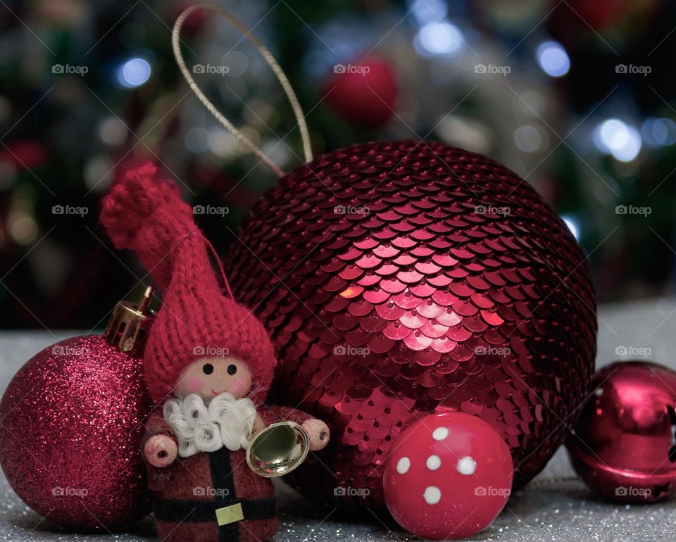 A collection of Christmas decorations in shades of magenta 