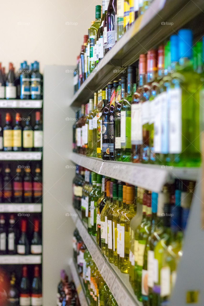 shop poles with different types of wine