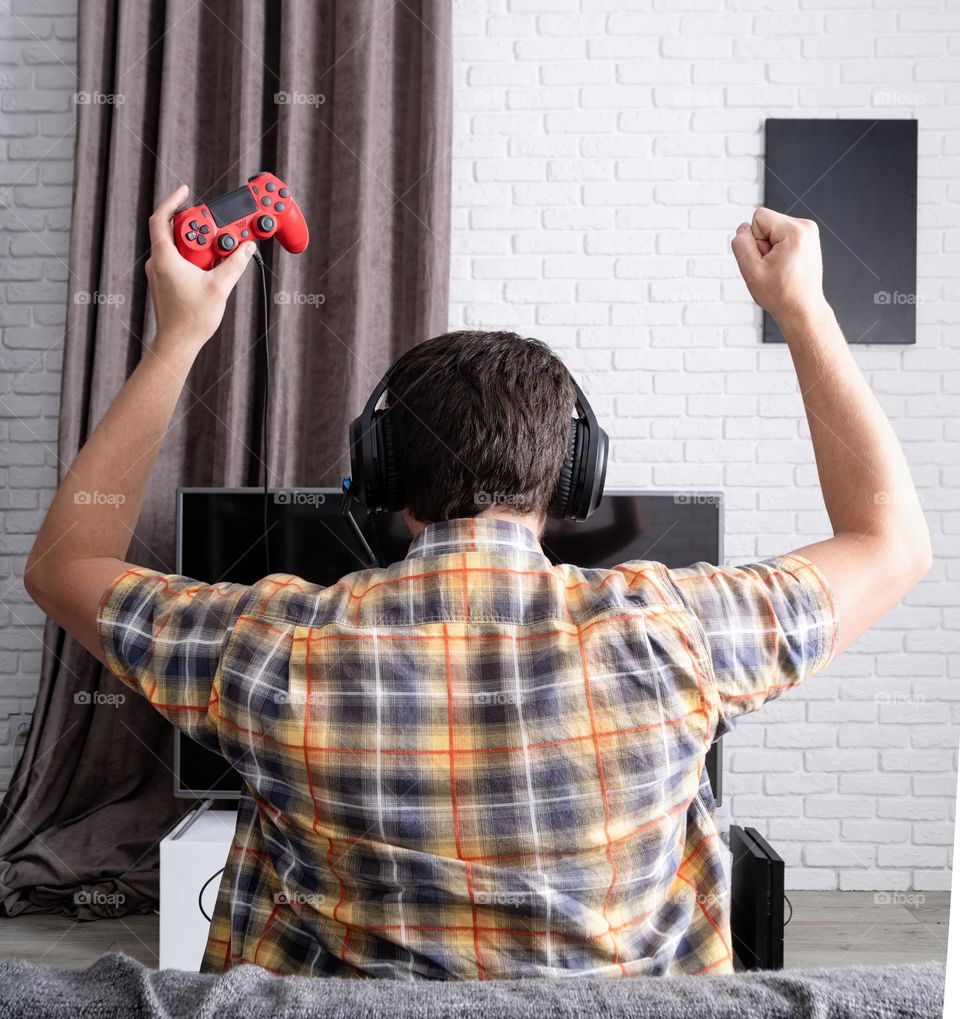 man playing video games