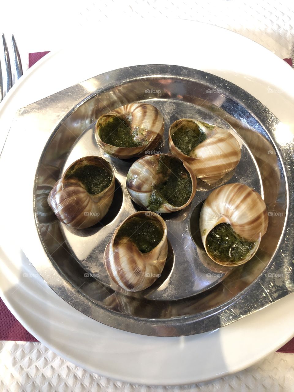 Grilled snail with sauce. This is the dish I ate while in France. Fat salty salty taste. Very delicious