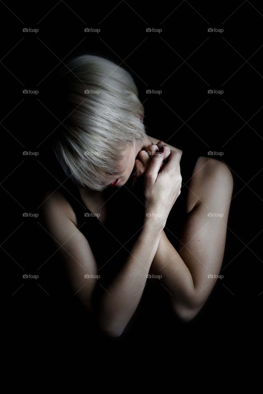 Young woman with black background