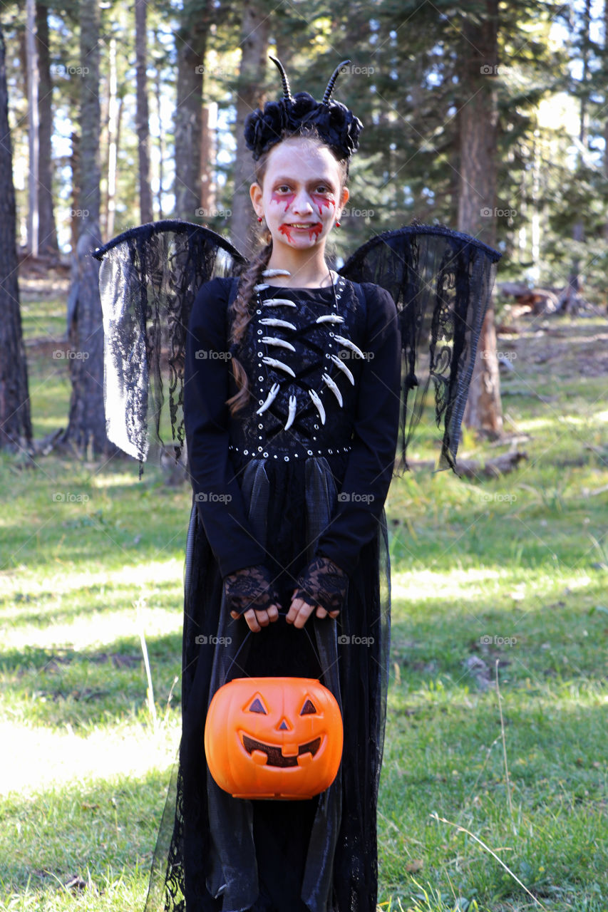 Child wearing Halloween costume