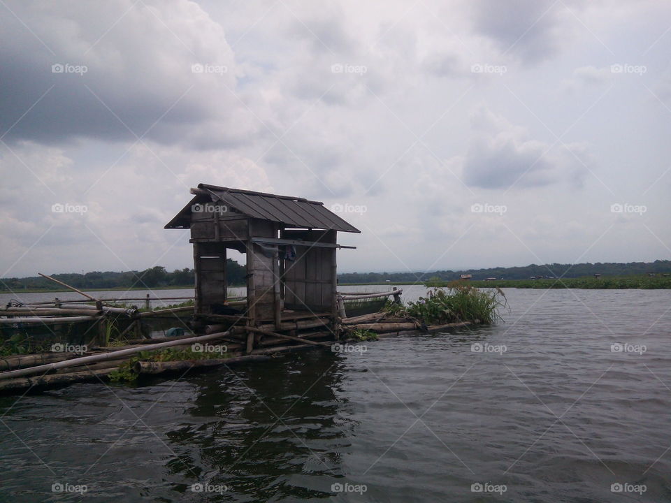 hut in the middle of the reservoir cengklik solo central java Indonesia