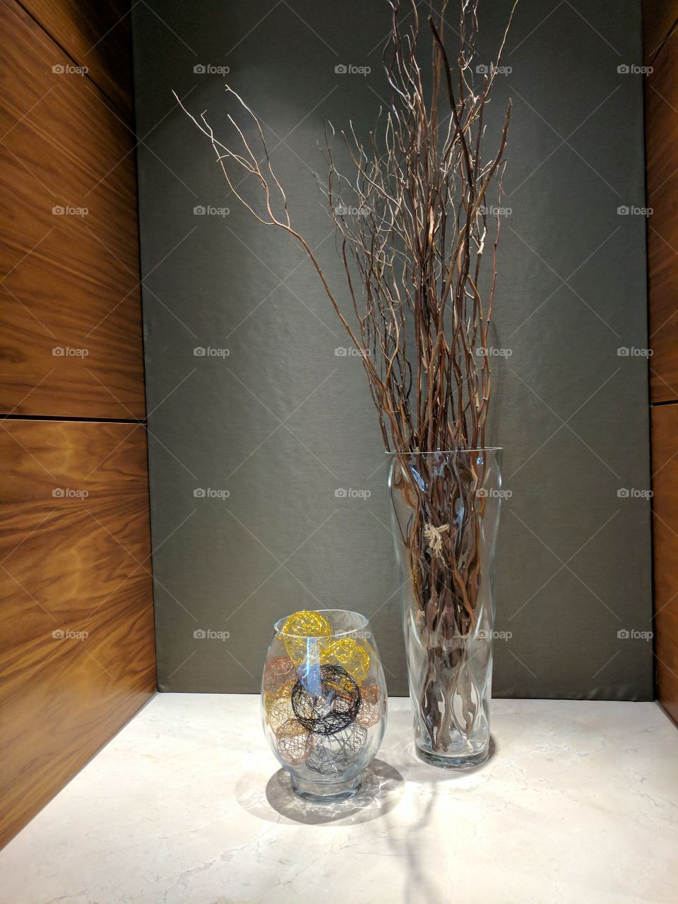 interior design glass vases with decorative bundles of branches and decorative wire balls