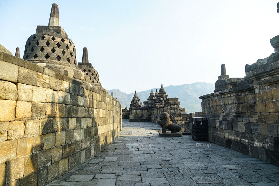 one of the corners of borobudur temple when the sunset came