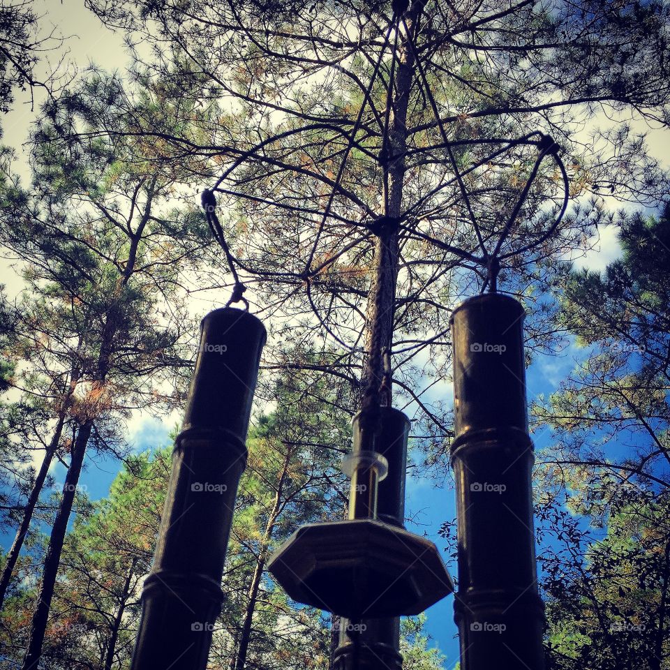 Wind chimes in a still day.
