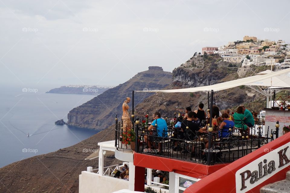 Restaurant overlooking the caldera in Fira, Santorini l, Greece 