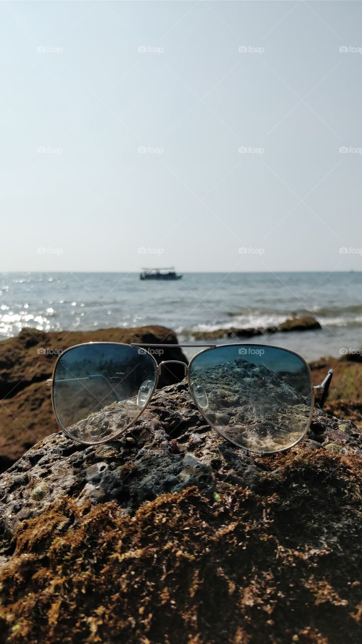 look the nature with natural viewing sunglasses. nature, beauty, sunglasses, goggles, beach, sea, rocks