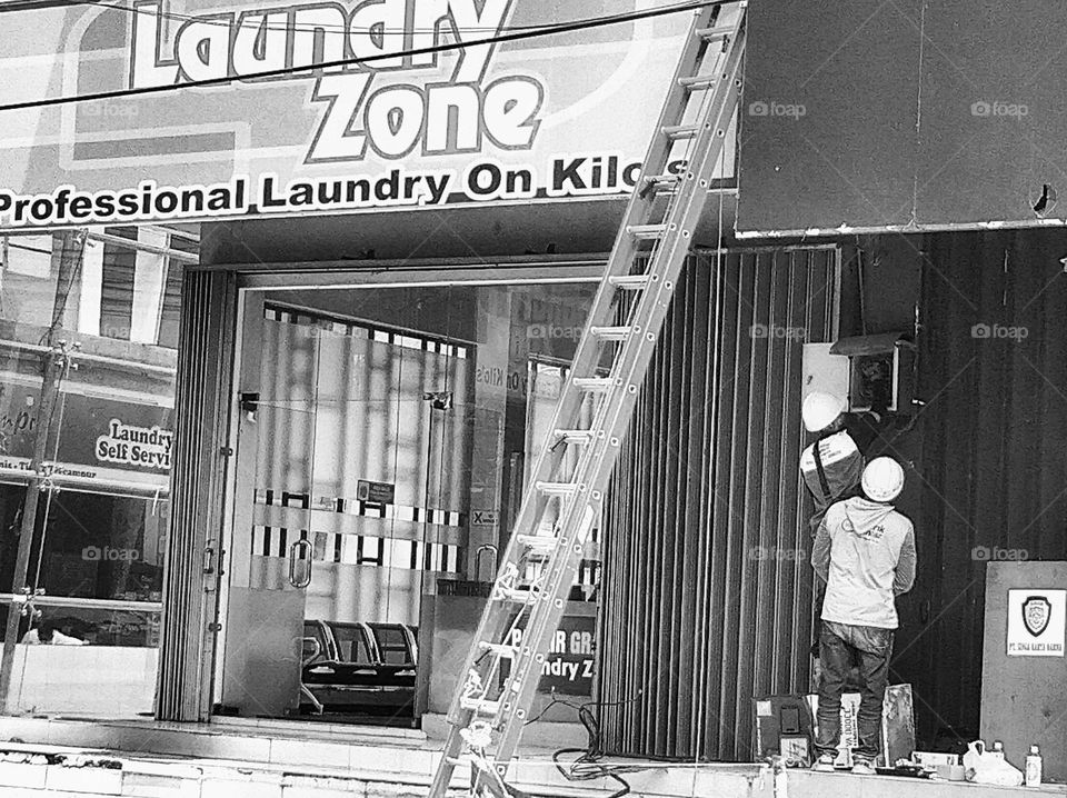 Electrician repairing the grid